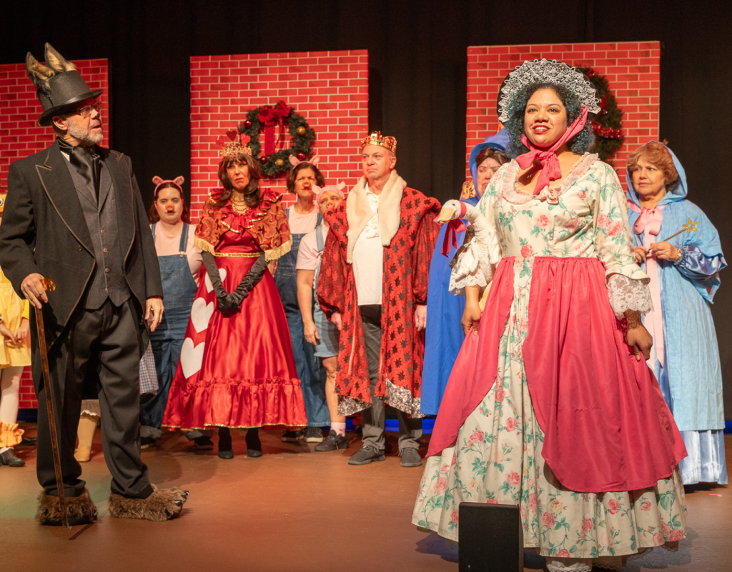 A group gathering in a fairytale Dickens Christmas Carol spoof